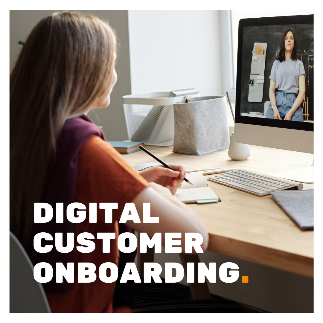 Digital Customer Onboarding superimposed on a picture of a woman taking a video call with another woman whilst taking notes in a diary