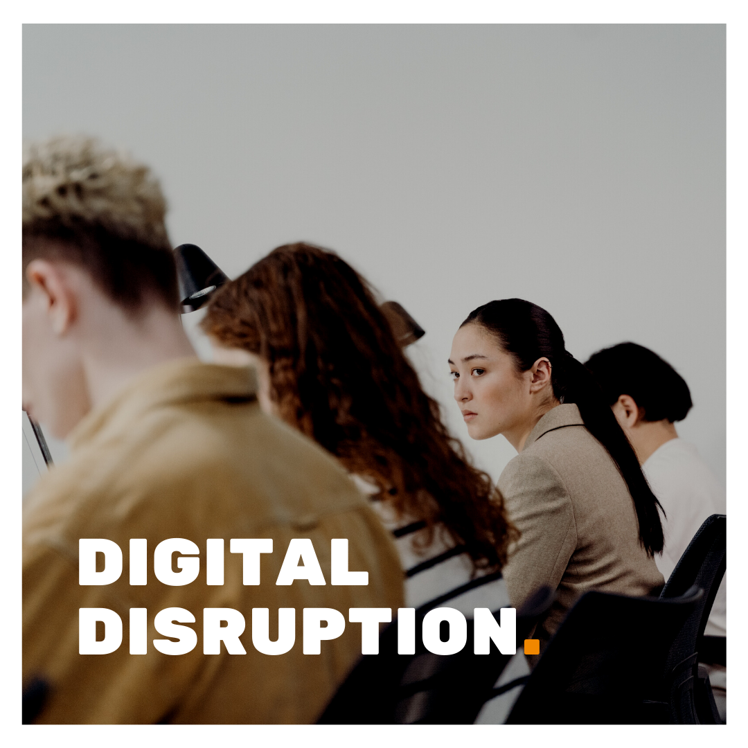Digital Disruption superimposed on a picture of 4 people with one of them, a woman, looking pensive