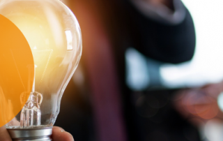 Customer Communications Management with a lightbulb turned on.