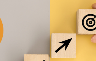 a graphich showing 2 wooden blocks one with a pointer to the second with a target with an arrow in the centre