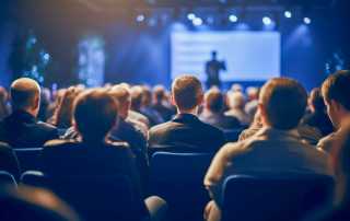 People sat in auditorium - Sefas Is Attending Insurtech Insights Europe 2025.